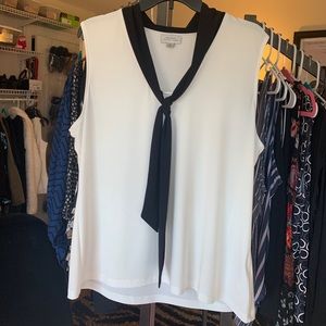 Creme with black bow and neckline shell